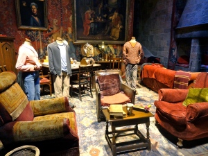 Gryffindor Common Room, with Ron, Hermione and Harry's costumes